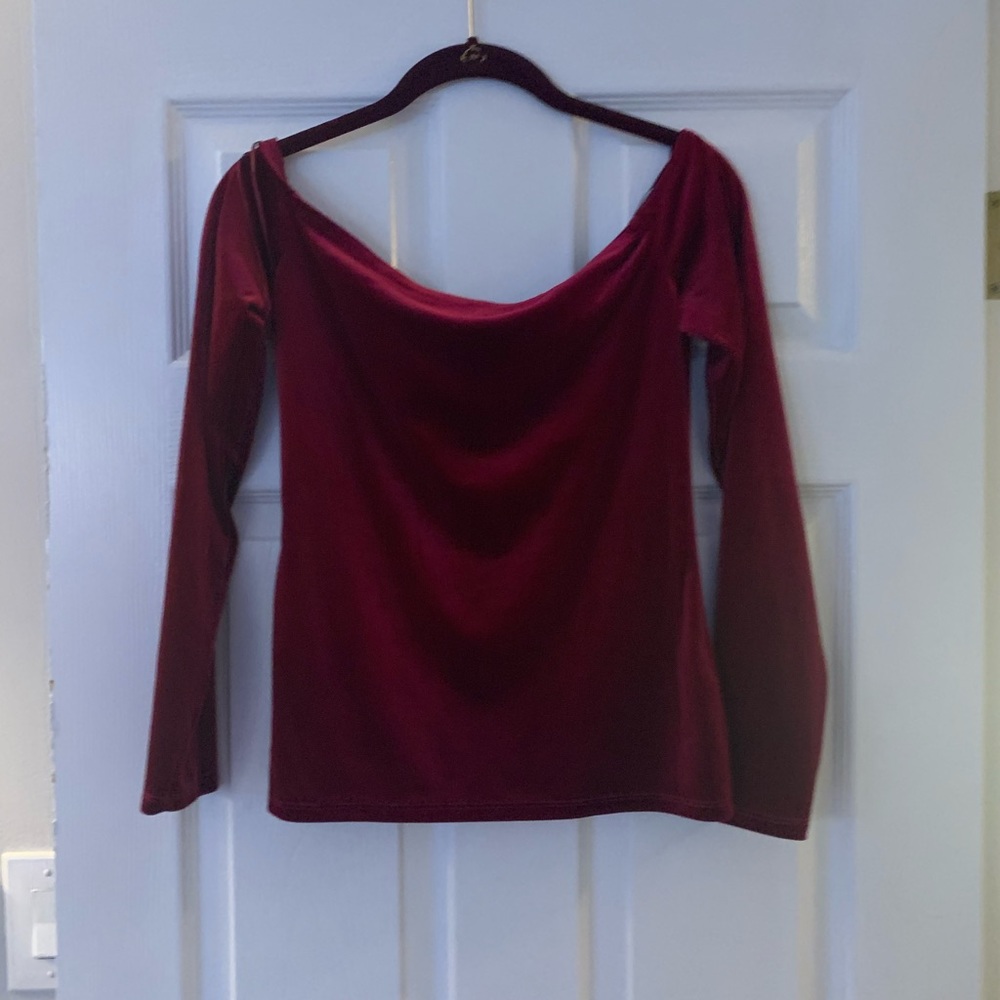 Velvet shirt , gently used , worn once and laundered gently .